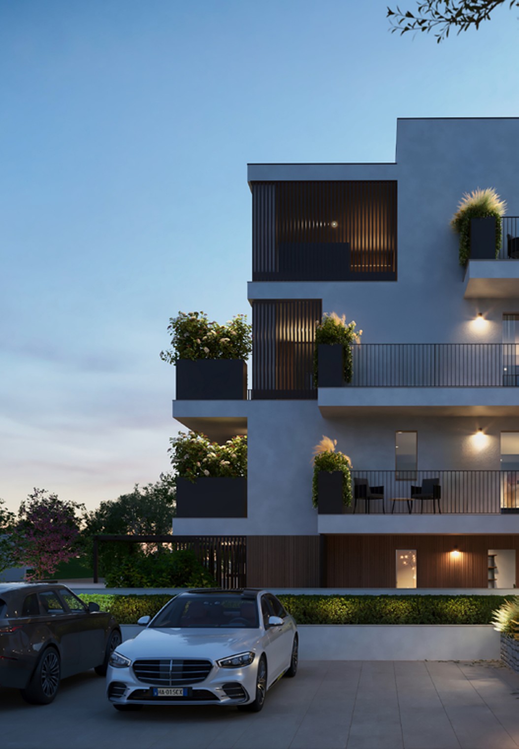 Render serale del complesso con le finestre illuminate